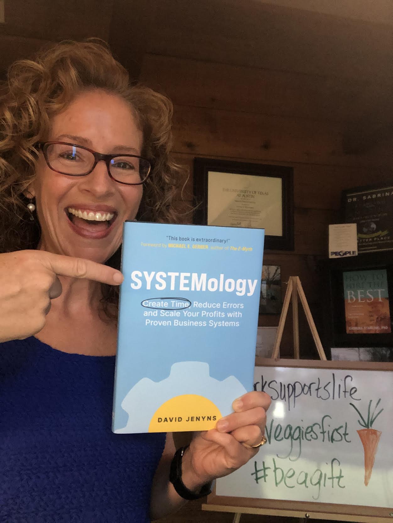 Dr Sabrina with the SYSTEMology book