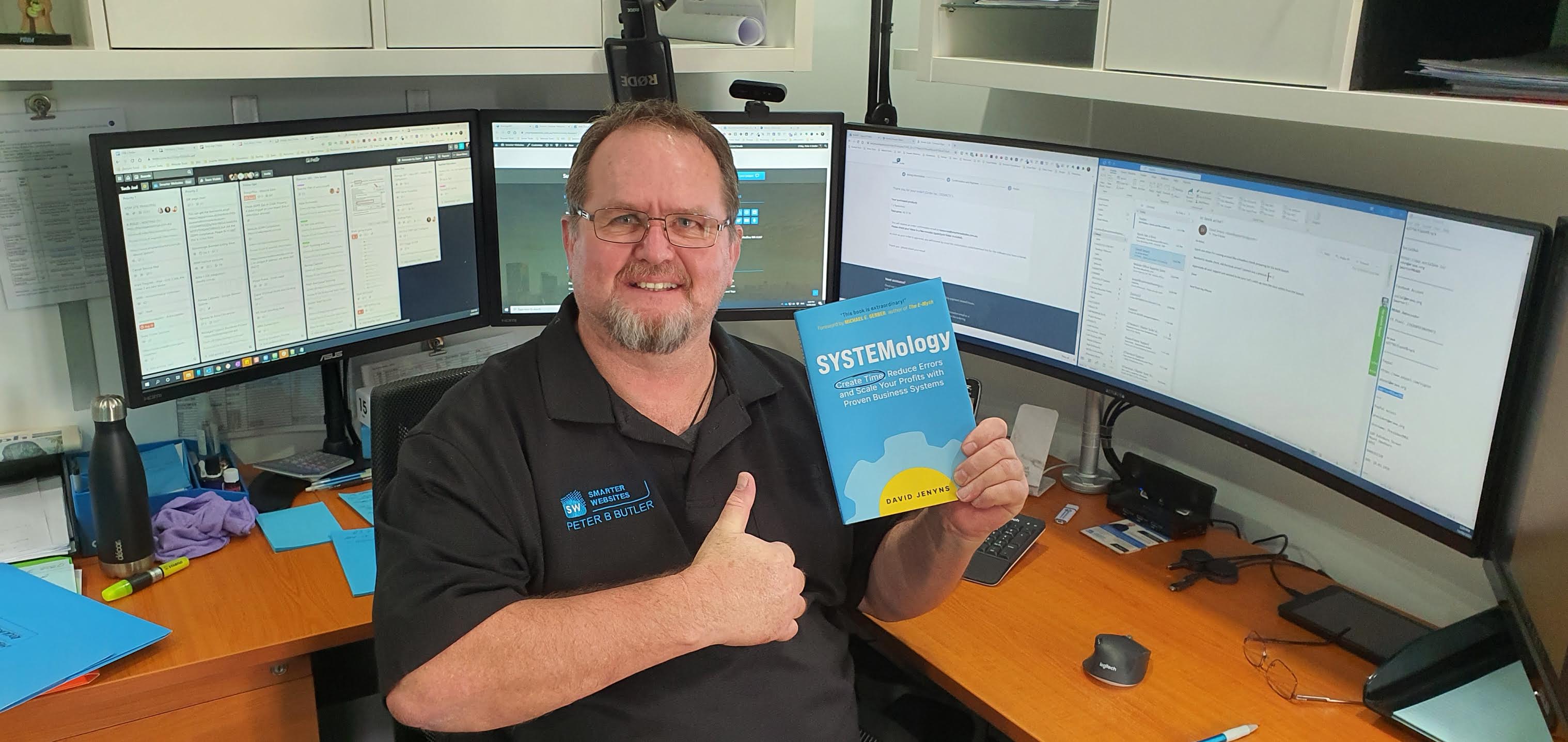 Peter Butler with the SYSTEMology book